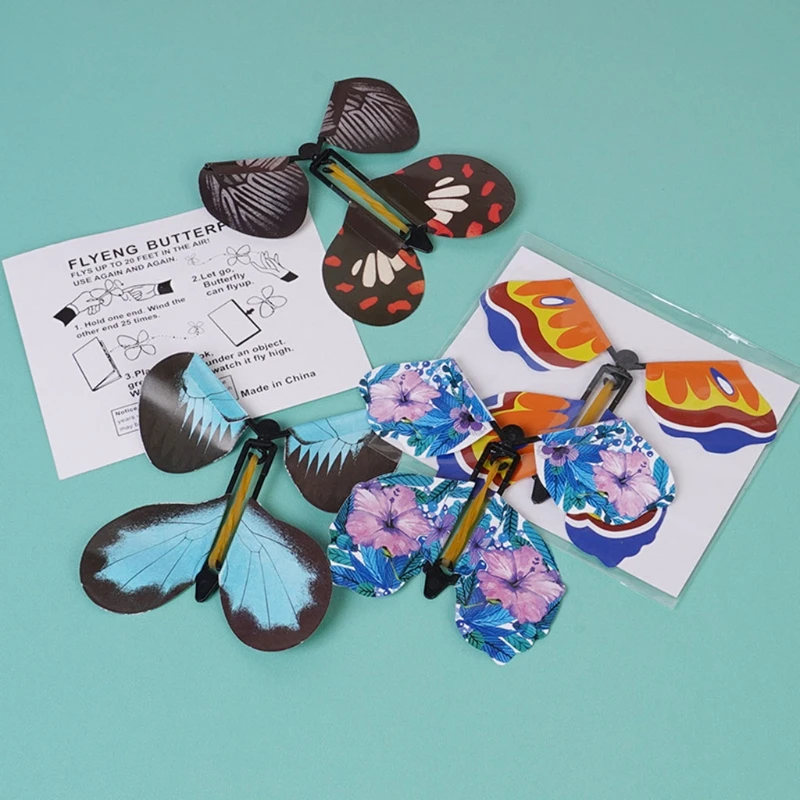 

10 Pcs Flying in the Book Fairy Rubber Band Powered Wind Up Butterfly Toy Gifts XX9E