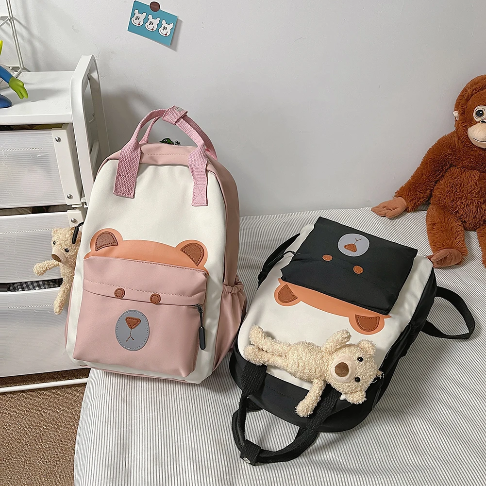 

Women Preppy Style Backpack with Bear Pendant Fashion Girl Backpack Casual Multi Pockets Vintage School Bags