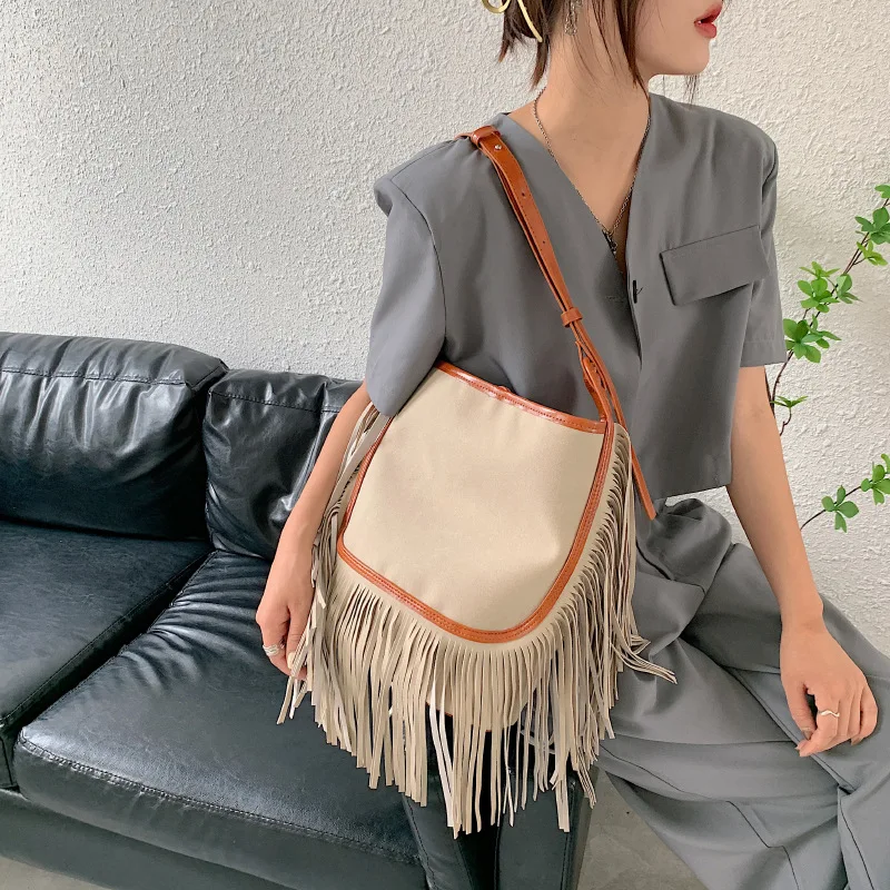 

New Tassel Designer Retro Female Bag Women Bucket Bag Pu Shoulder Bag Messenger Bag Sac à Main BandoulièRe Femme Omuz çAntaları