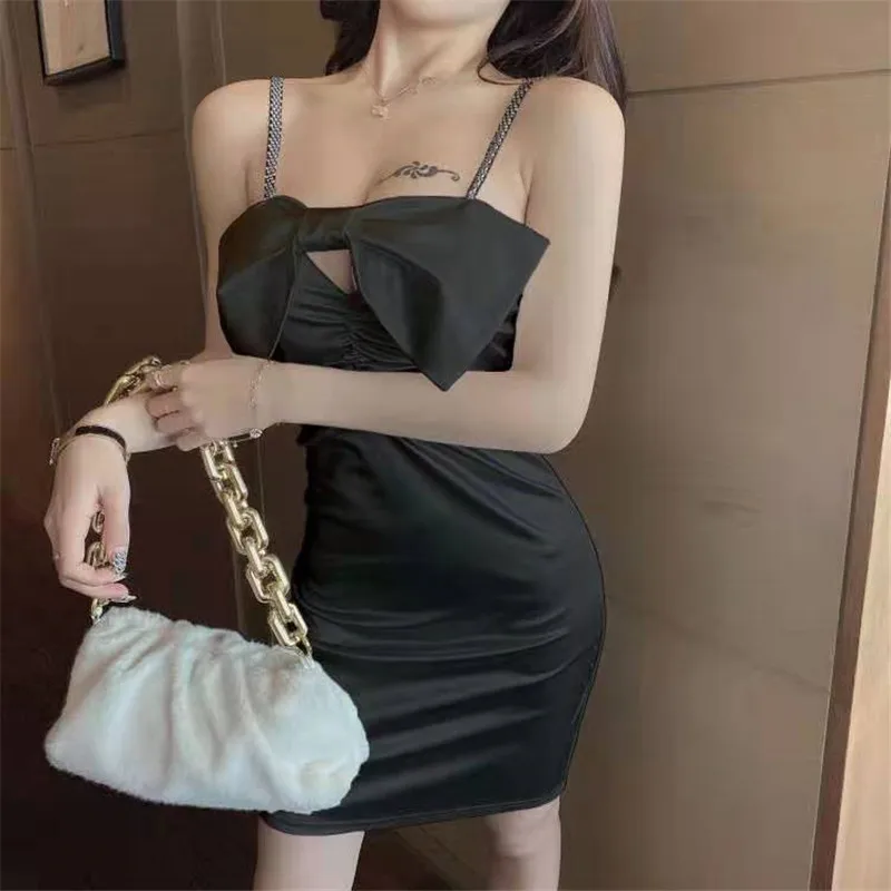 

2021 new sexy nightclub slim slimming pearl strap bow knot bag hip dress