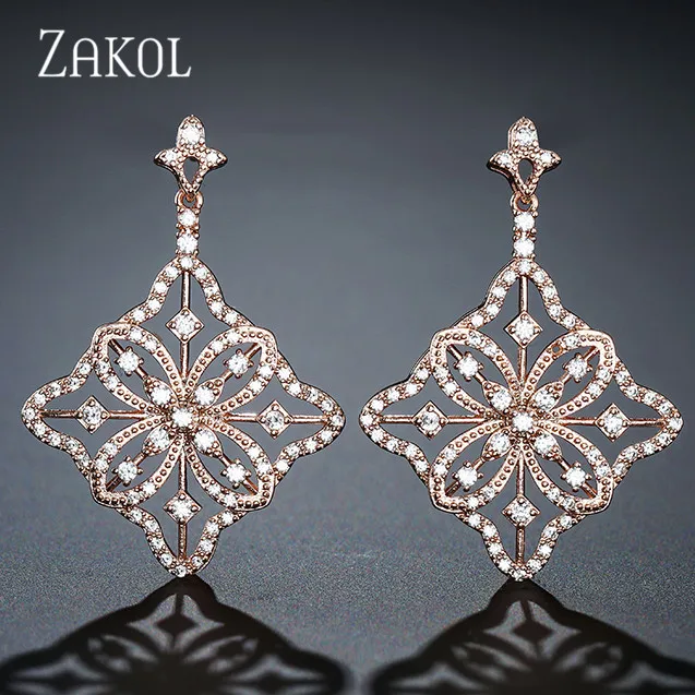 Новинка серьги-подвески ZAKOL с медными цирконами полые цветы игольчатые серьги
