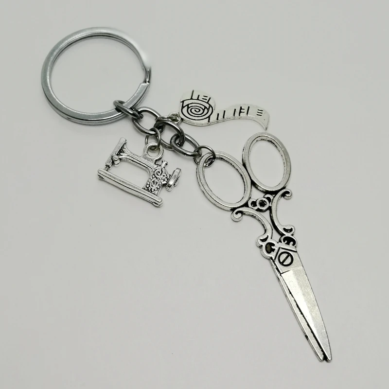 Фото Большой брелок ножницы швейная машина рулетка кольцо для ключей - купить
