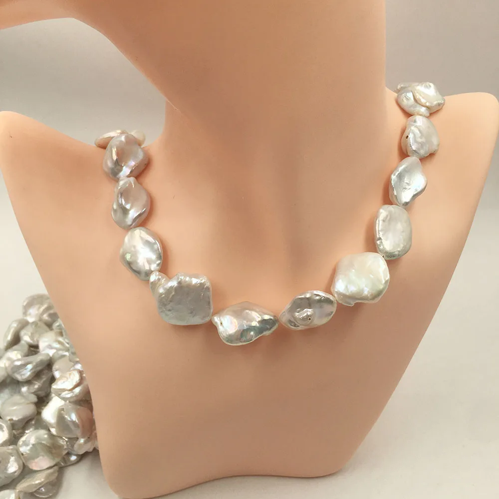 Жемчуг бурмицкий. Сумка из белых перламутровых бусин. Яркий жемчуг. Яркий жемчуг. Культивированный жемчуг.