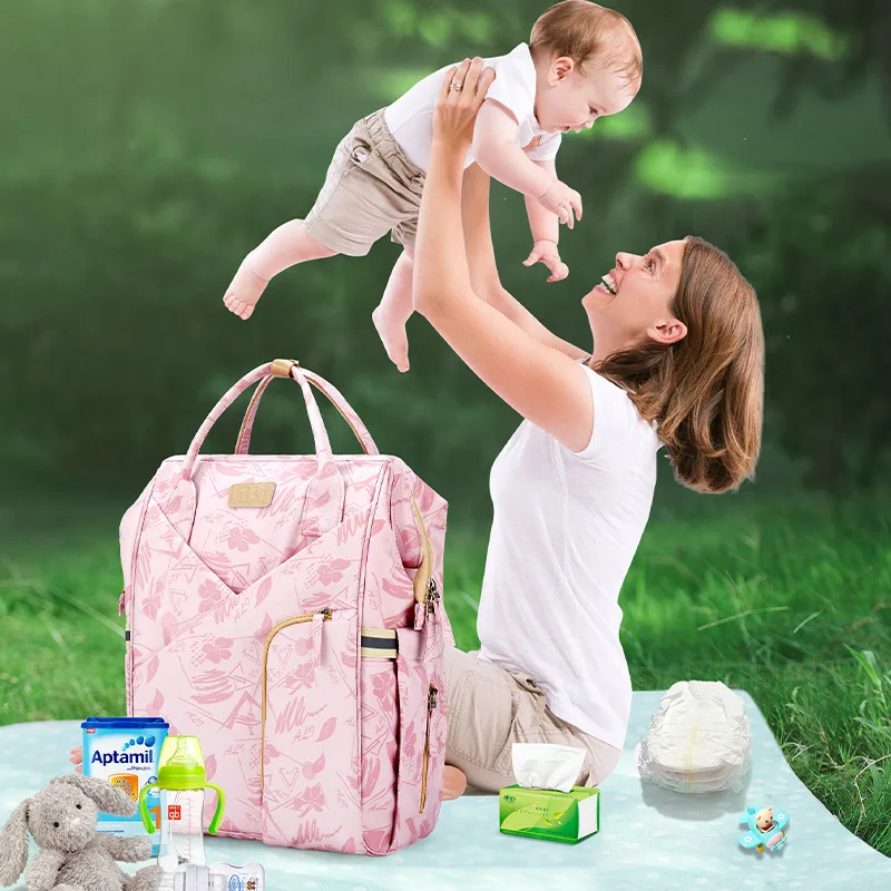 Новые рюкзаки для ухода за малышами New Mommy Baby Multi-function Care Backpacks для путешествий на открытом воздухе, большой вместимости, модного дизайна и подходящих для коляски.