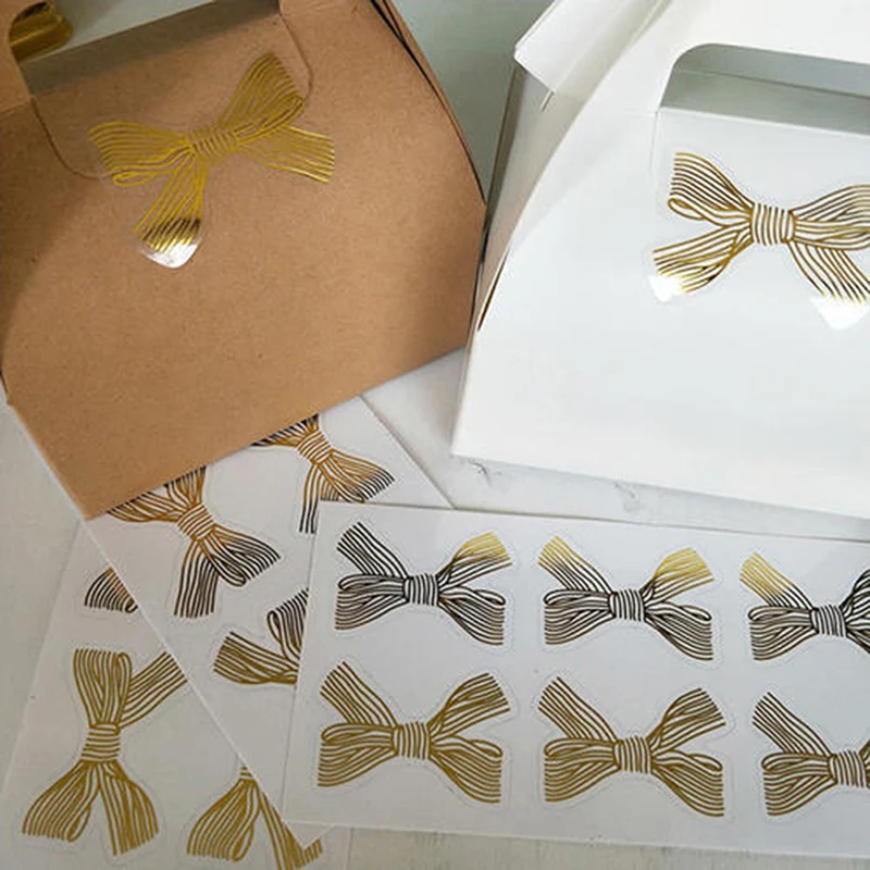 

60pcs/lot Cute Gold Bowknot Transparent Sealing Sticker DIY Gifts Package Labtb