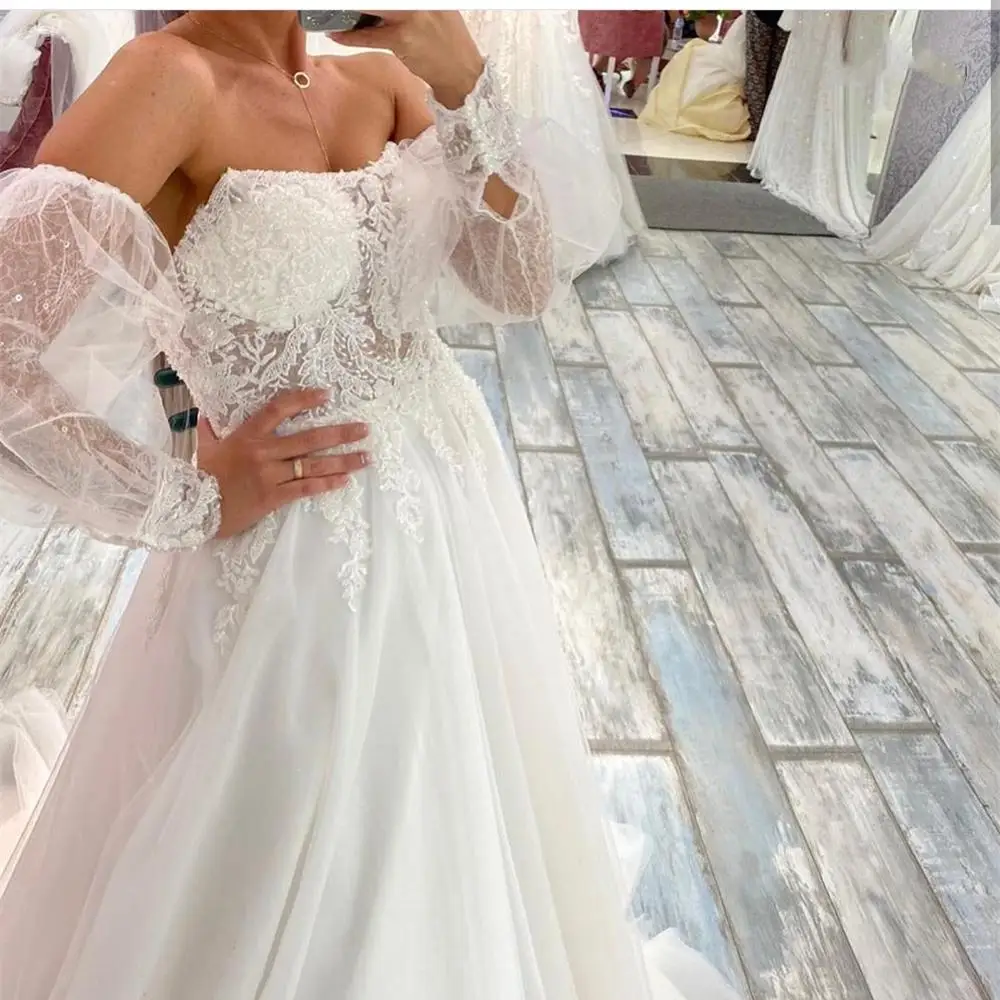 Свадебное платье с открытыми плечами трапециевидной формы свадебное из органзы