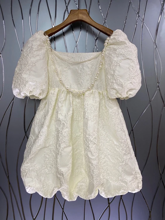 

2021 spring and summer short-sleeved square neckline neckline bead chain stitching back knotted lace jacquard skirt dress 0420