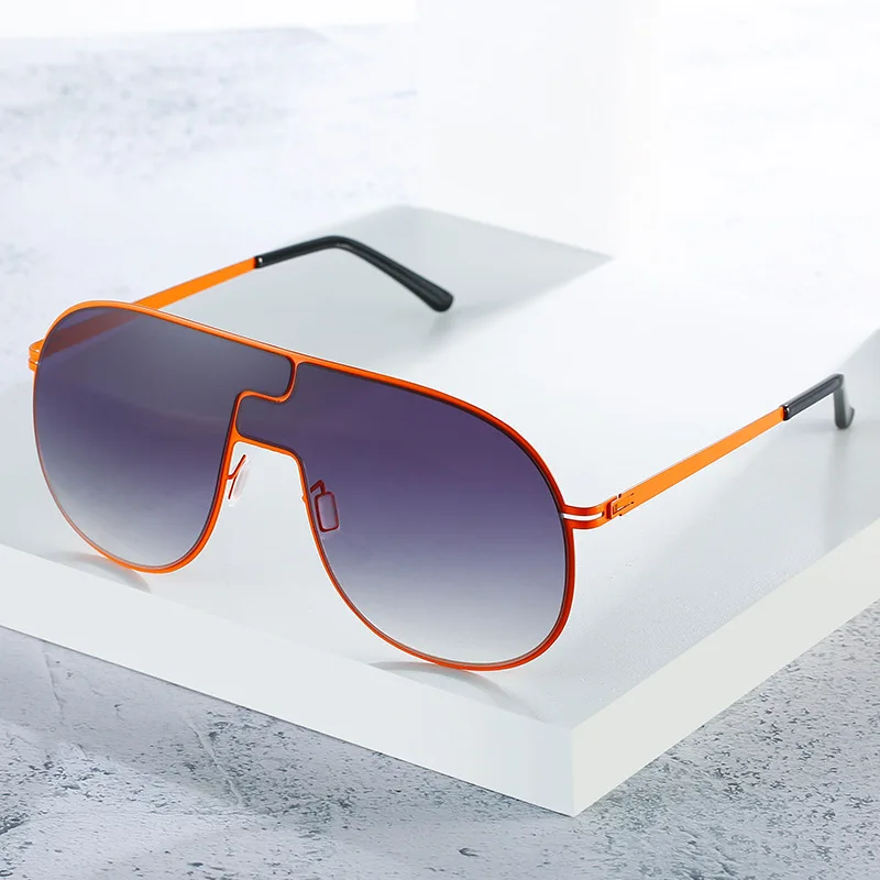 

2021 Fashion Frameless Trend Sunglasses Female Toad Large Frame Summer Travel Glasses Large Face Personalized Sunglasses