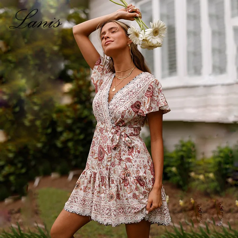 

2021 Spring and Summer New Women's Bohemian Beach Vacation Style Short Sleeve Deep V Large Swing Pleated Printed Dress Clothes