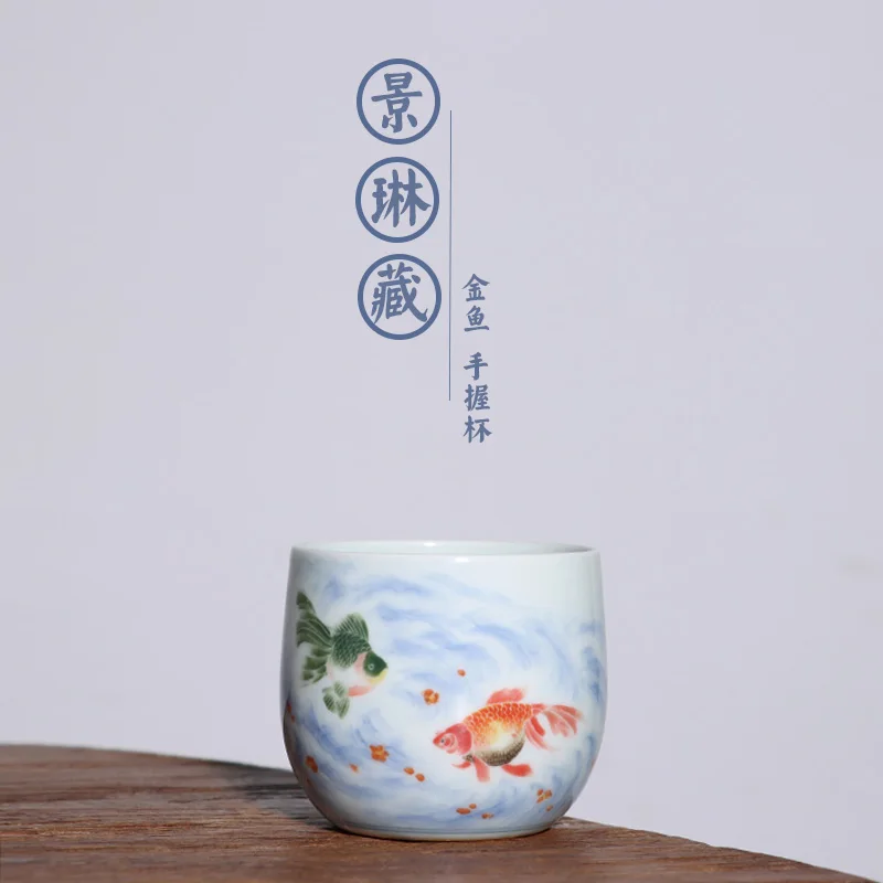 

Hidden JingLin goldfish holding a cup of large master cup order with blue and white glaze high-end tea cup 150 cc