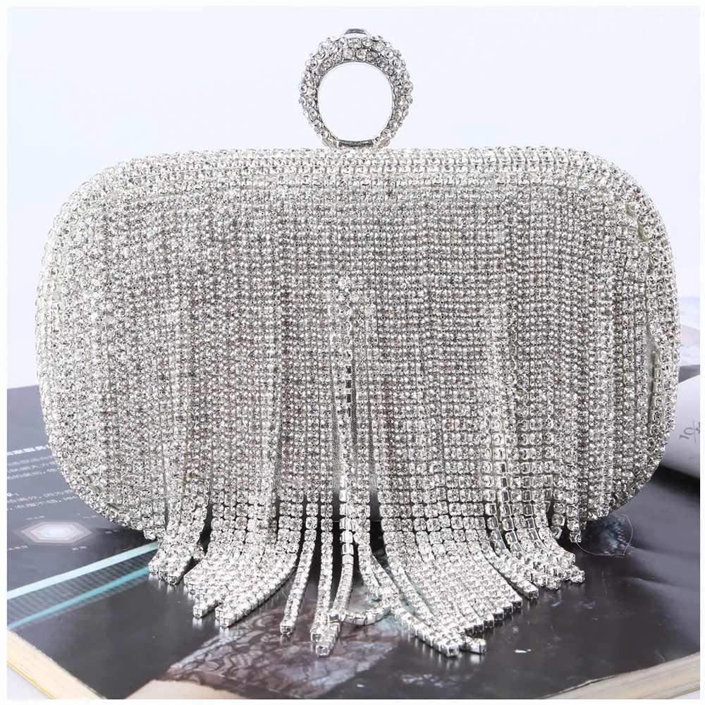 

Handmade ring with crystal fringe and evening cross strap handbag