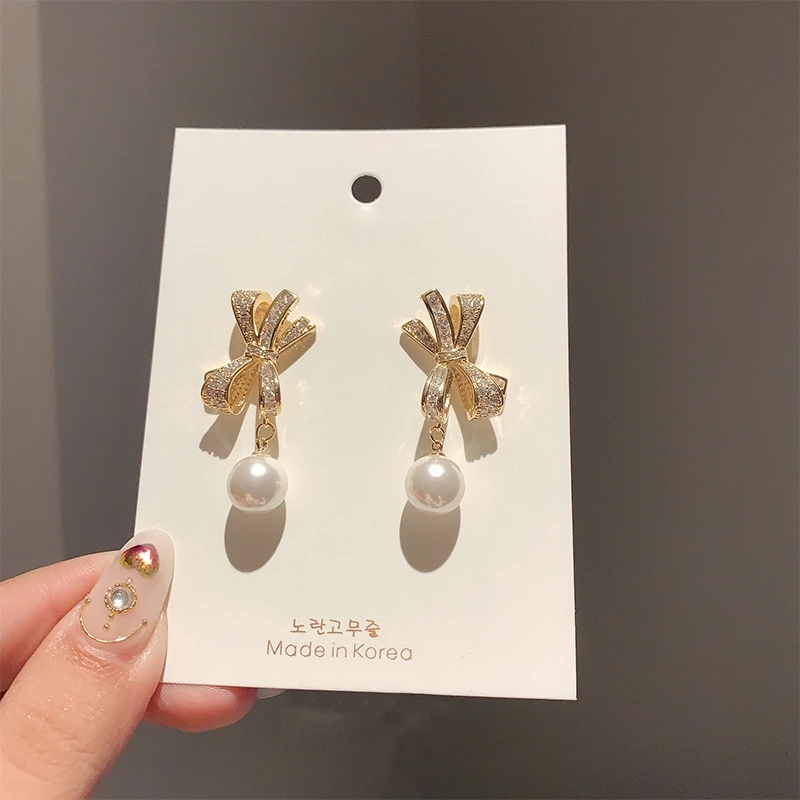 

MENGJIQIAO New Arrive Korean Cute Micro Paved Zircon Bowknot Drop Earrings For Women Girls Elegant Pearl Brincos Wedding Jewelry