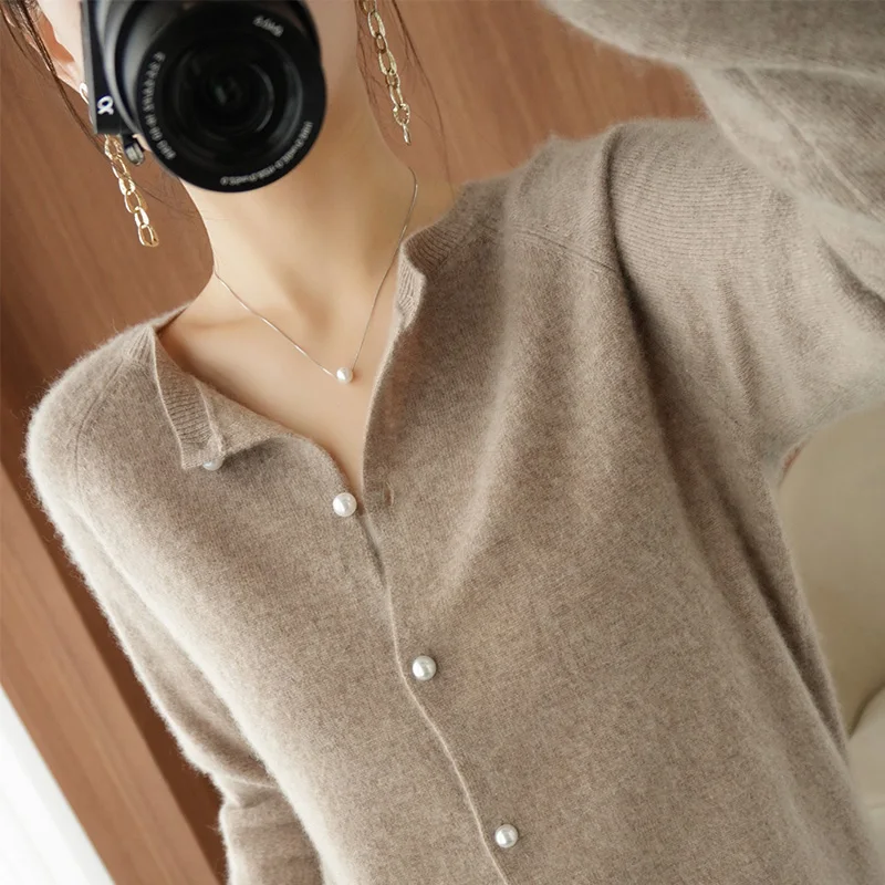 

Spring and autumn new cashmere sweater cardigan women's fashion O-neck solid color short section was thin 100% wool top