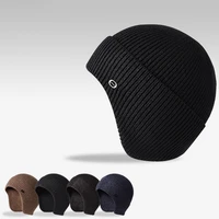 new arrive man autumn winter solid color knitted fastener simple outdoor warm ear flaps sport casual cover bonnets beanie hats