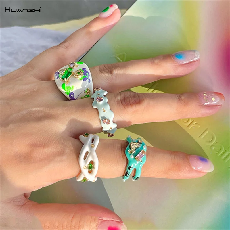 

Разноцветное кольцо HUANZHI для женщин и девушек, асимметричное открытое перстень с жемчугом и цирконием в форме сердца, с геометрическим узор...