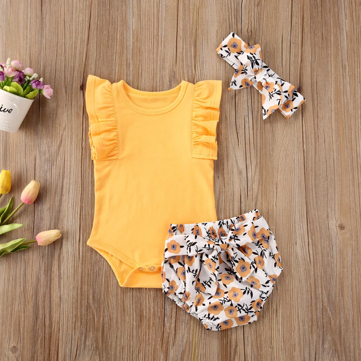 

Pudcoco Newborn Baby Girl Clothes Summer Solid Color Sleevelee Ruffle Tops Flower Print Shorts Headband 3Pcs Outfits Cotton Set