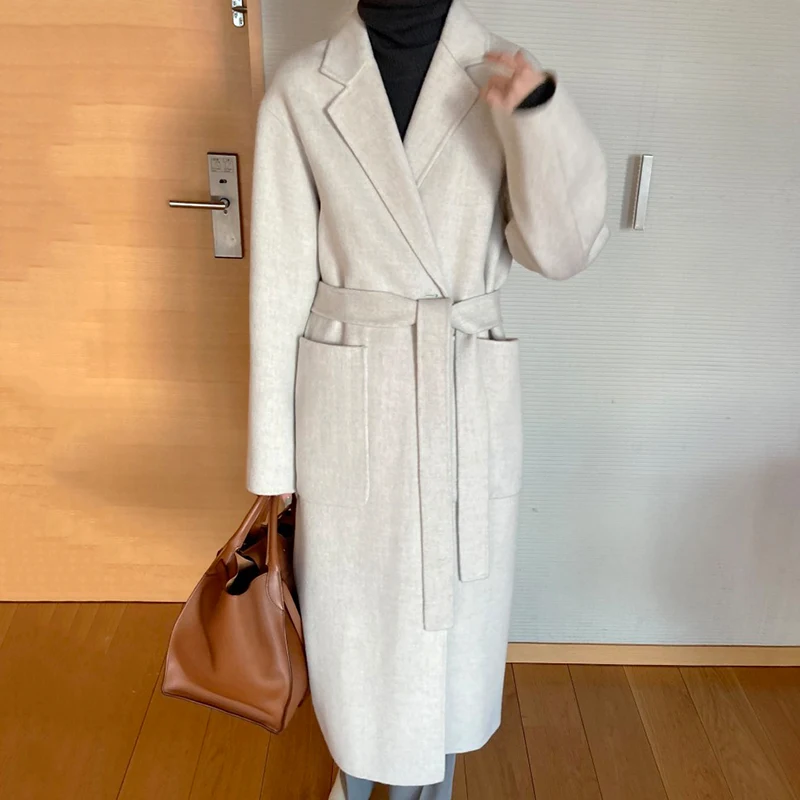 

Женское утепленное шерстяное пальто Wavsiyier, Свободное длинное теплое элегантное однотонное пальто с английским воротником, на шнуровке, зим...