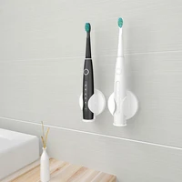 creative electric toothbrush holder automatic zooming and clamping wall mounted punch free rack storage bracket bathroom