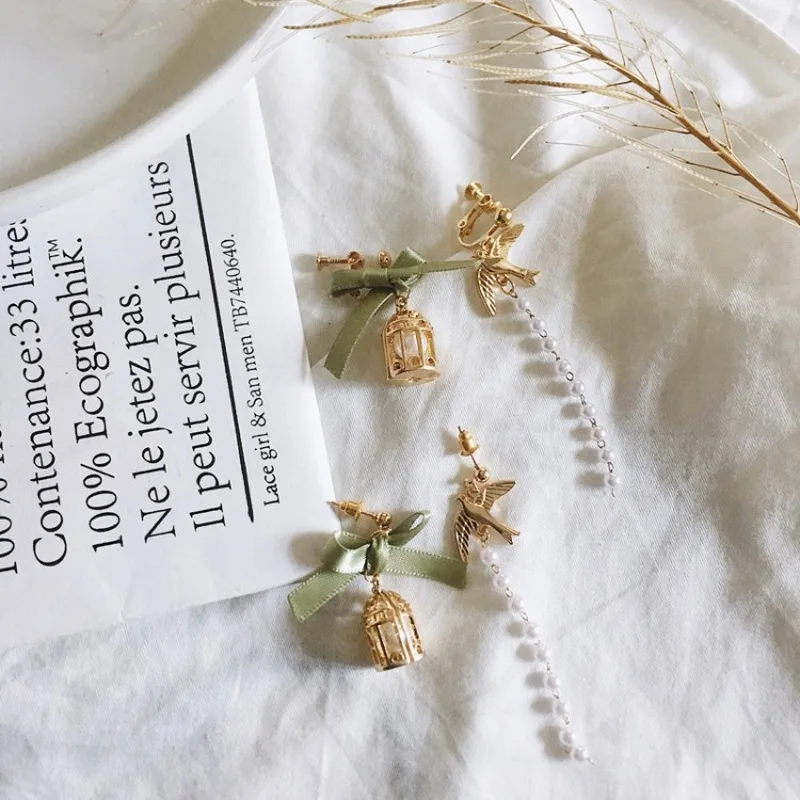 Модные корейские ювелирные изделия асимметричный бант клетка для птиц клипсы