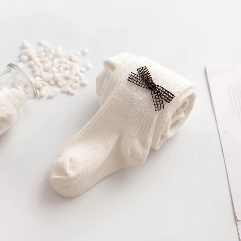 

Thin children's tights bows socks spring Baby tights baby girls clothes Solid pantyhose 1-8Y toddler girl 2021 cheap stuff