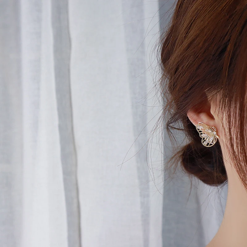 

Anti-allergy needle hollow design clever vibration wings butterfly dangler zircon jewelry women wedding earrings