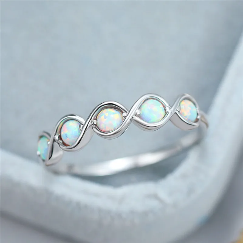 

Cute Female Round Infinity Cross Ring Vintage White Fire Opal Wedding Rings For Women Elegant Rose Gold Color Finger Ring