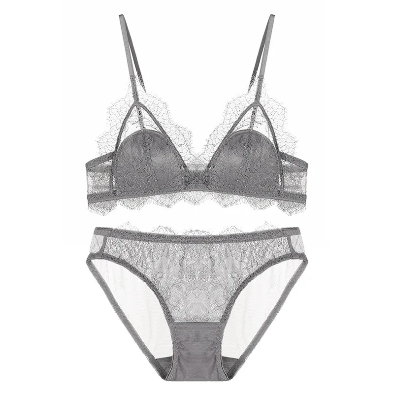 Пикантный французский бюстгальтер кружевной треугольный с ресничками и трусики
