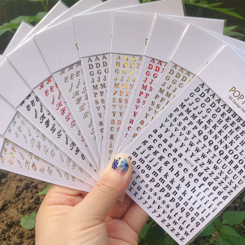 

2021 New Colorful 26 Alphabets Nails Sticker DIY Manicure Decal Laser Numbers Nail Art Decorations English Alphabet Stickers