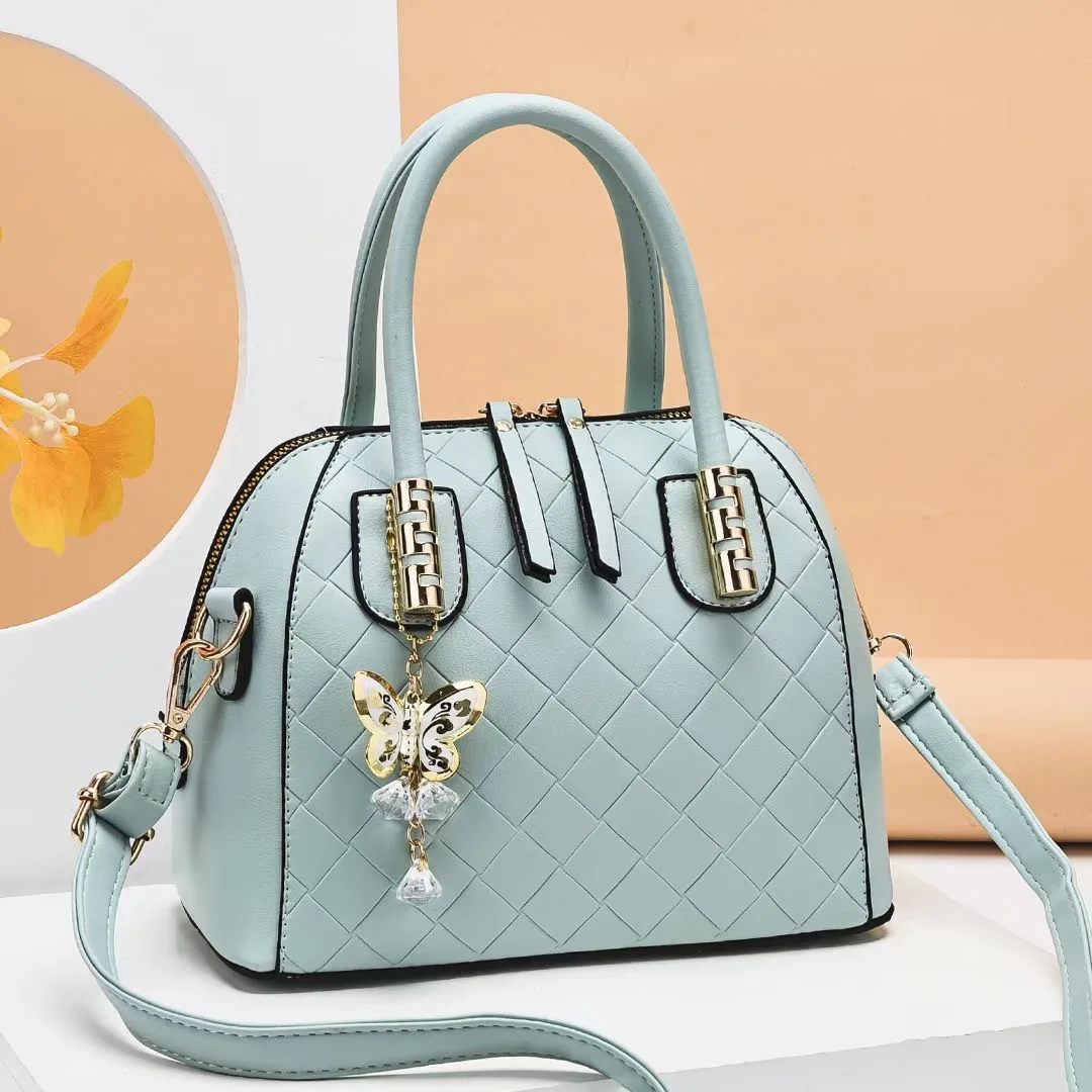 

Boutique recommended autumn bag 2021 new fashion women's bag shoulder diagonal bag Fashion shell shape simple handbag