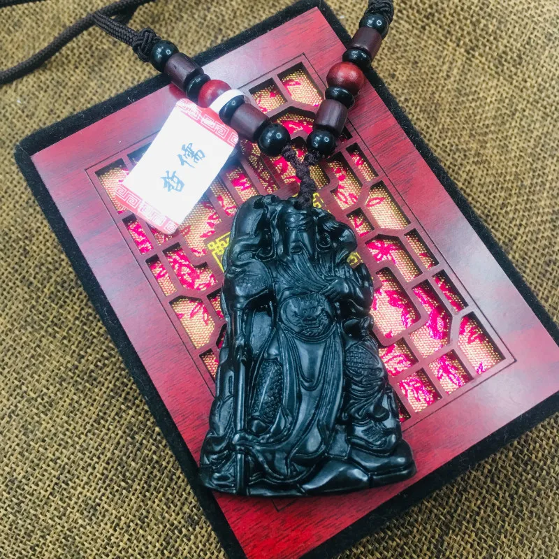 

Natural black stone Hand-carved black three-dimensional large Guan Gong pendant necklace Men and women sweater chain