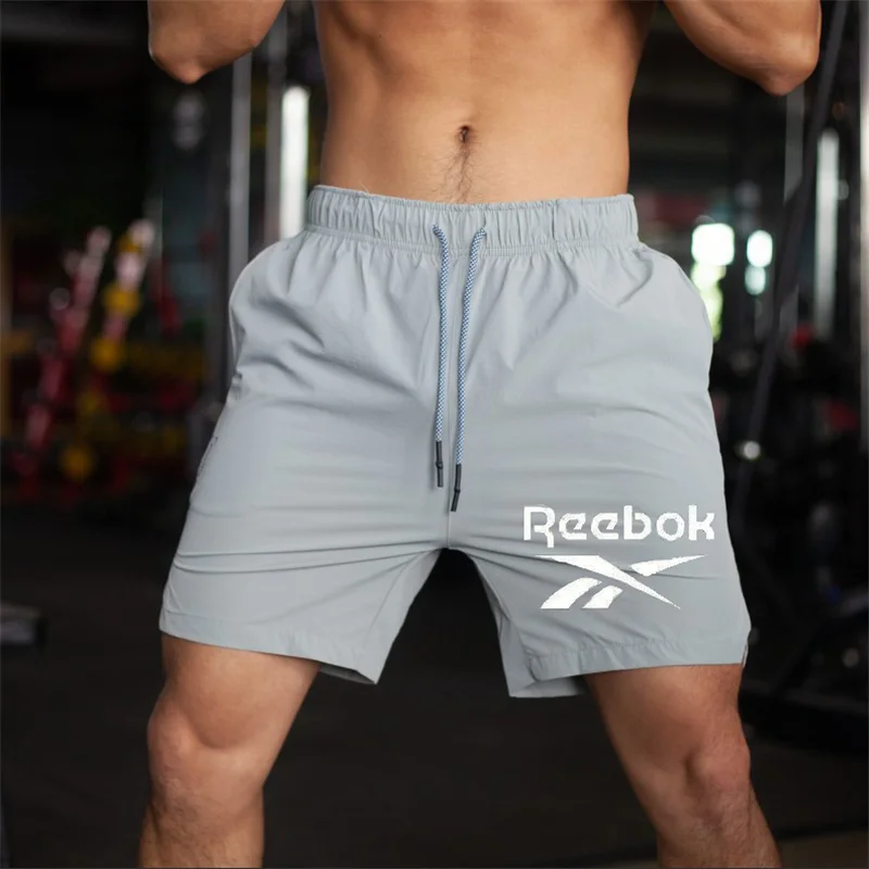 

2021 Summer Men's New Exercise Jogging Loose Elastic Pants Beach Pants