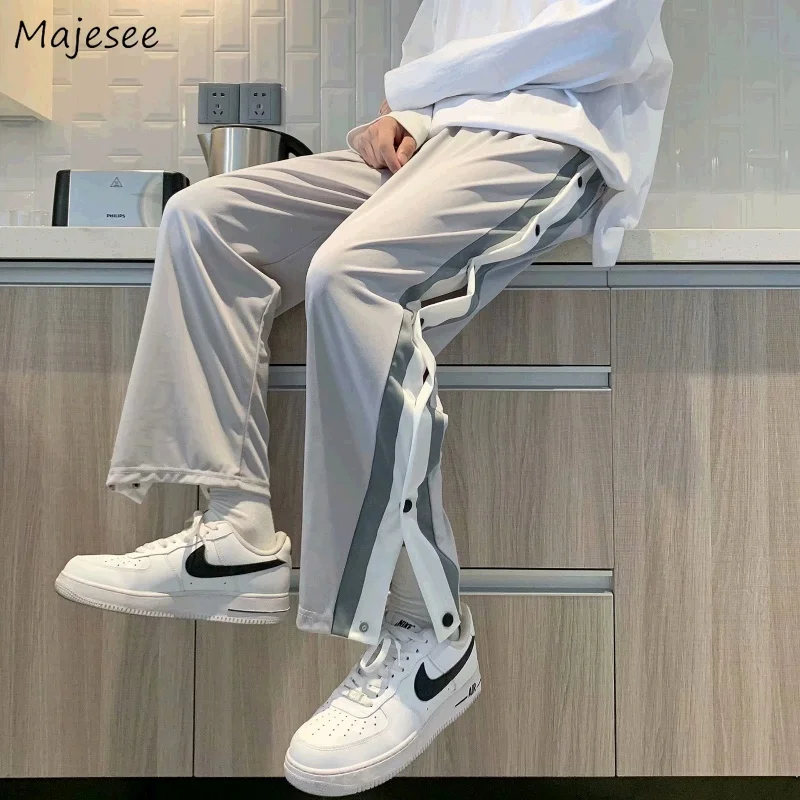 

Дизайнерские повседневные мужские брюки на пуговицах с Боковым Разрезом унисекс парные подростковые свободные уличные брюки большого раз...