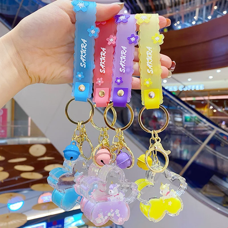 

Creative Liquid Floating Horse Keychains Holder Sakura Quicksand Sequin Keyring
