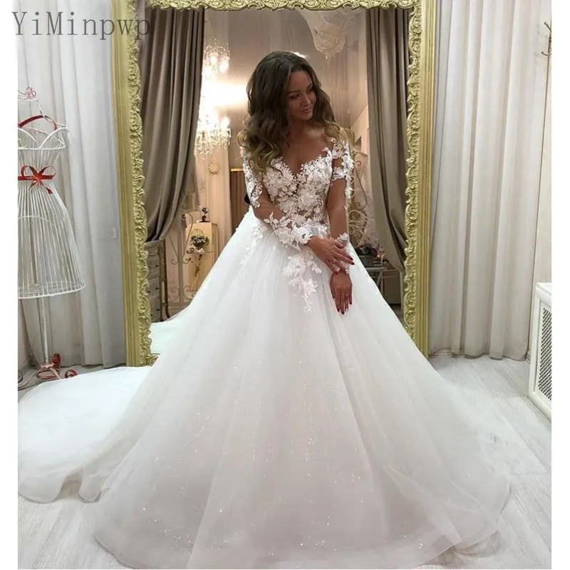 

YiMinpwp Sparkle Wedding Dresses 2020 Sheer Neck Long Sleeve Sweep Train Appliques Illusion Bodice Bridal Gown vestidos de novia