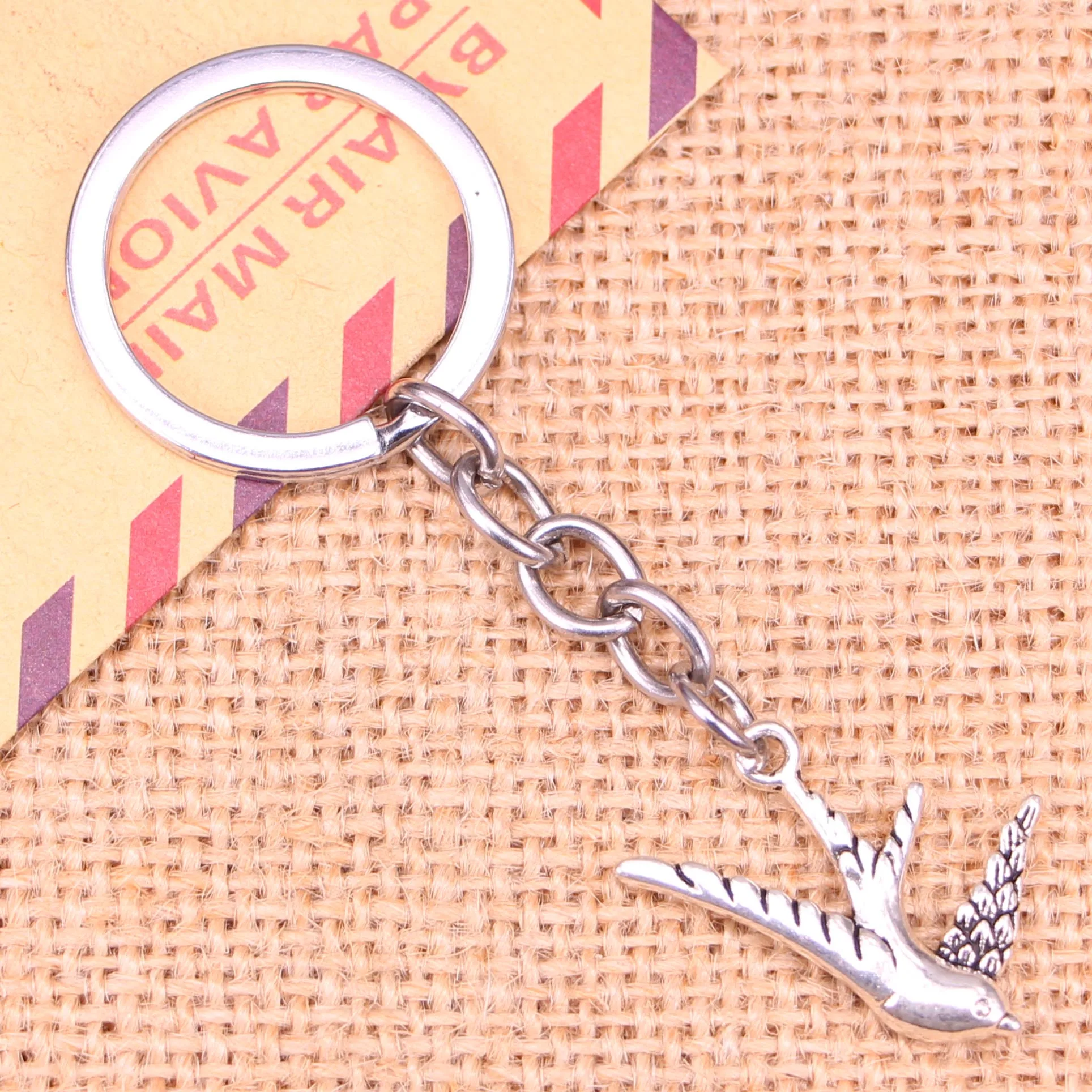 20pcs New Fashion Keychain 26x25mm flying swallow bird Pendants DIY Men Jewelry Car Key Chain Ring Holder Souvenir For Gift