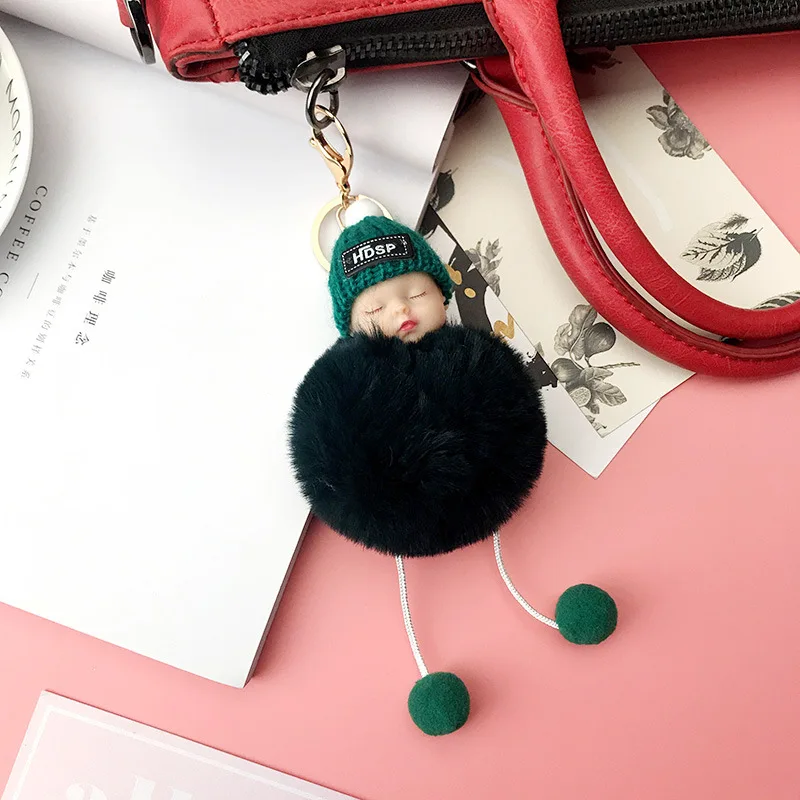 

Baby Doll Toy DropshipCute Sleeping Baby Doll Key Chains For Women Bag Toy Key Ring Fluffy Pom pom Faux Fur Plush Keychains
