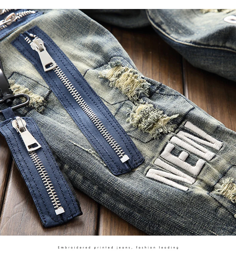 

New Spring autumn Japanese retro elastic hole tide brand jeans men's male slim straight European American zipper beggar trousers