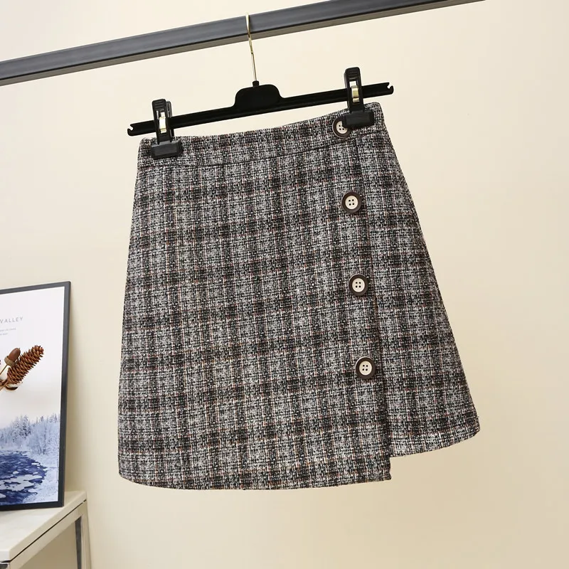 Шерстяная клетчатая юбка трапециевидной формы с пуговицами и асимметричным