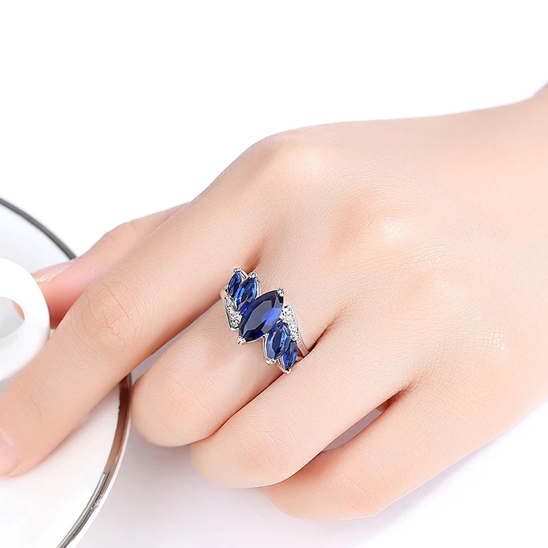 Женское кольцо с кристаллами циркония фиолетовое зеленое водное синее