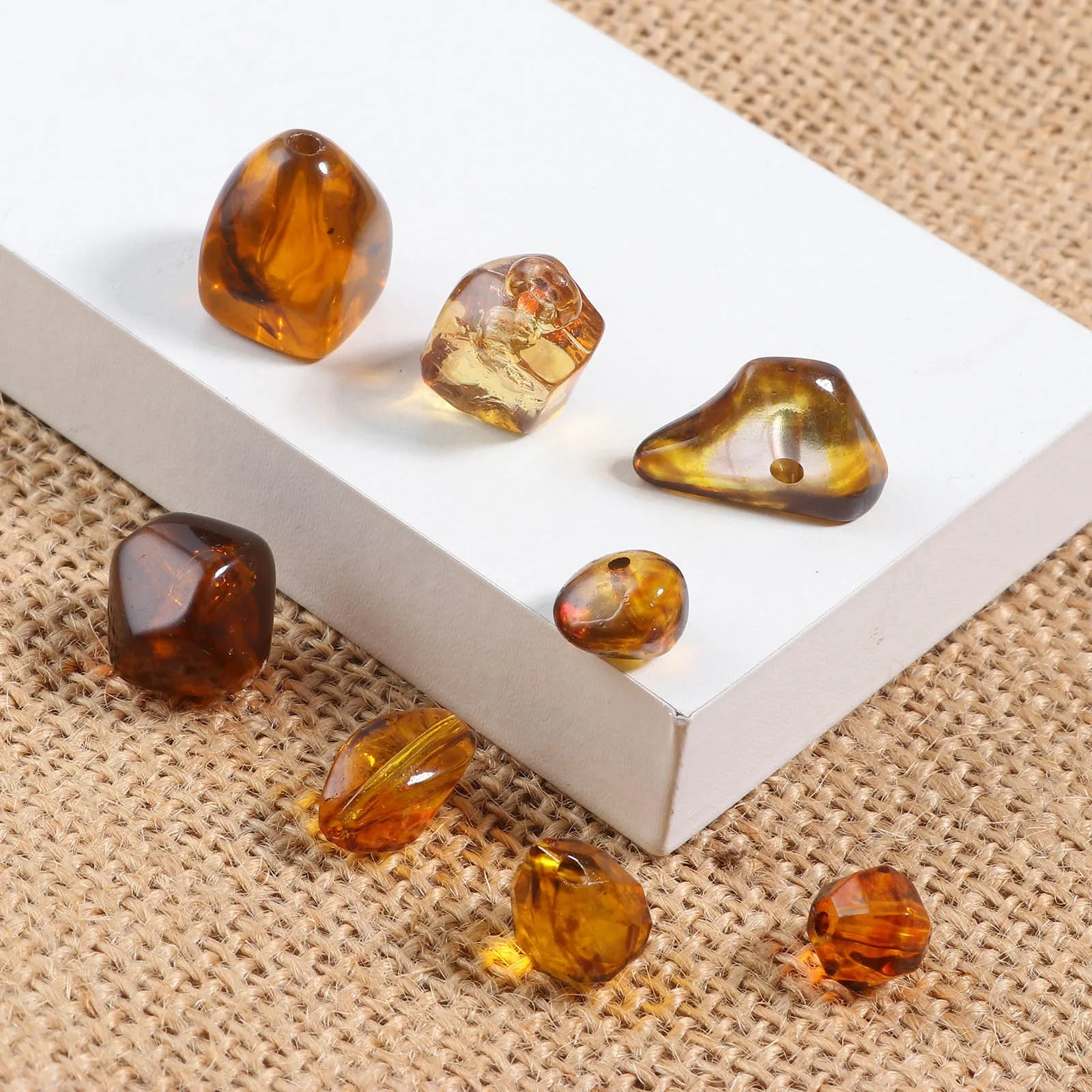 

Бусины янтарные коричневые ассиметричные для изготовления браслетов, 100 г