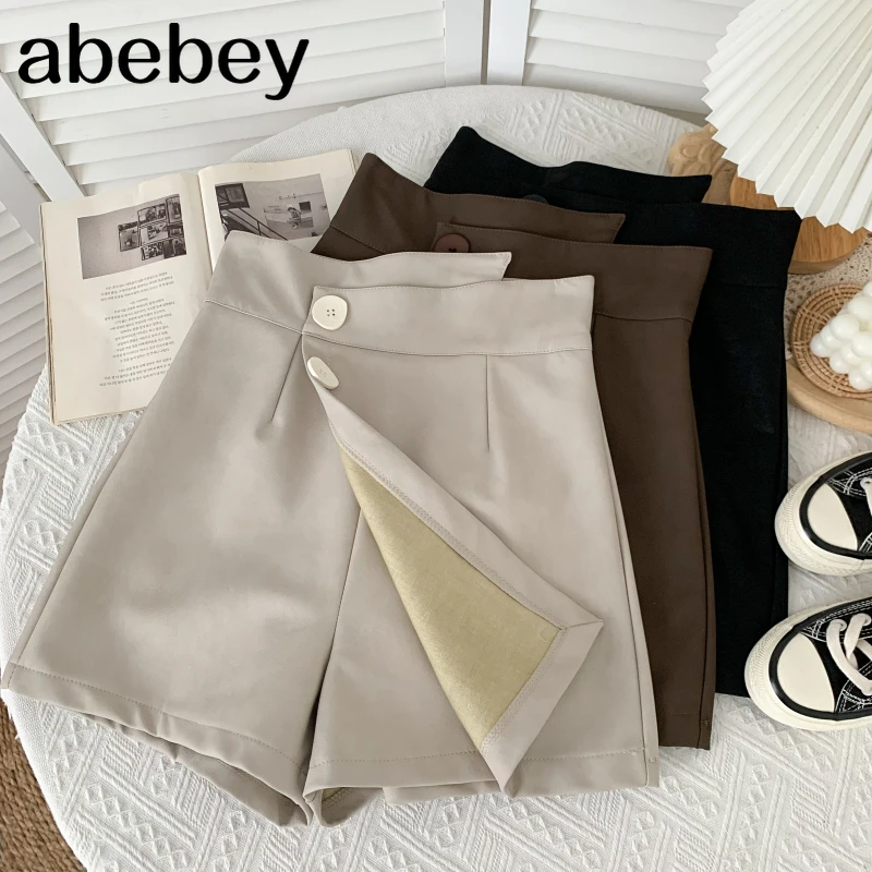 

Fashion solid color PU leather Shorts two buttons irregular design high waist leisure wide leg Shorts 2021 New Spring Autumn