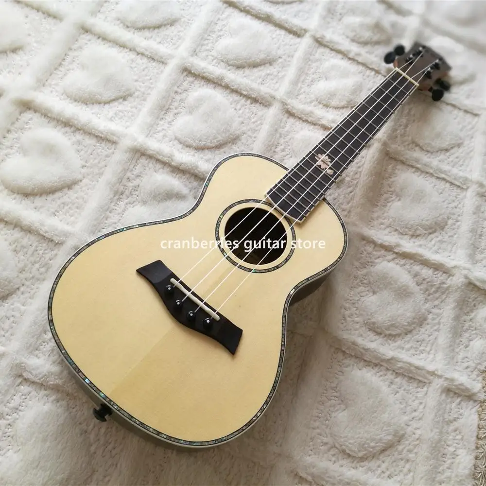 

matt finished 4 strings ukulele,solid spruce top min acoustic guitar,abalone binding and inlay,rosewood backFree shipping