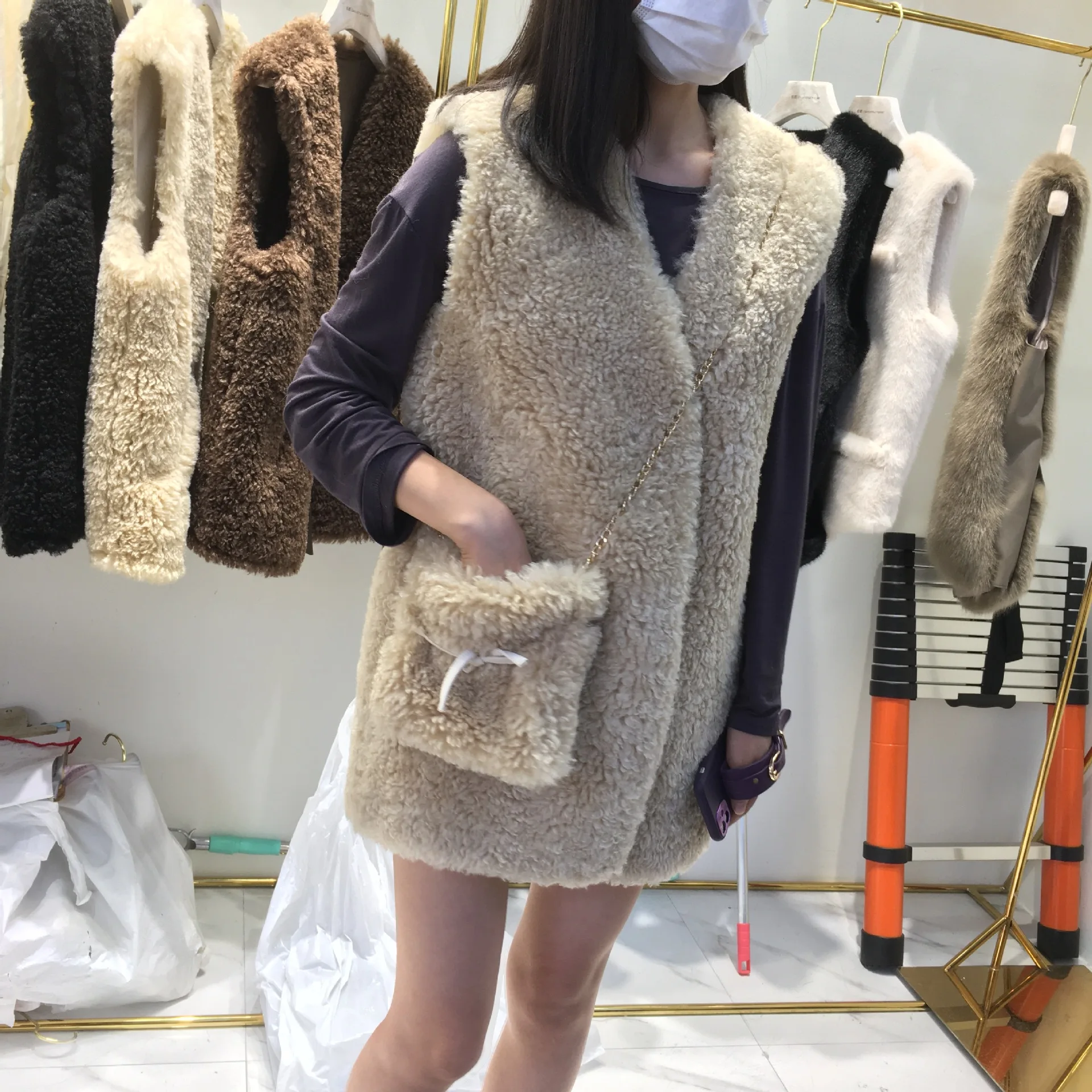

faux fur teddy coat Lamb vest women's 2020 new Korean version of loose fur vest with bag mid-length autumn and winter jacket