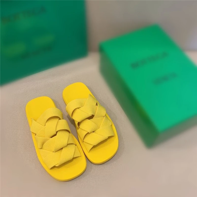

2021 European and American summer new style woven elastic band ladies slippers flat Roman sandals