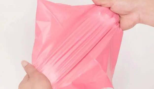 100 шт./лот розовые полупрозрачные сумки для курьерской упаковки утолщенная сумка