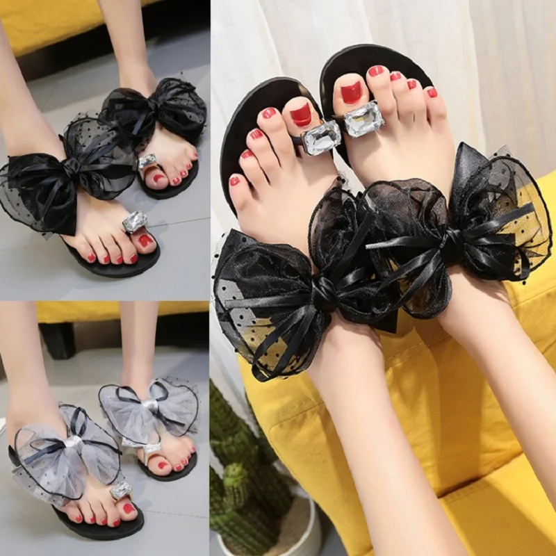 Шлепанцы женские с бантом и кристаллами сандалии цветами плоская подошва сланцы