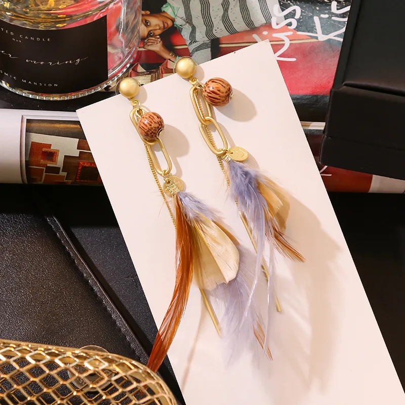 Длинные серьги с бахромой и золотыми перьями в стиле холодного ветра новые
