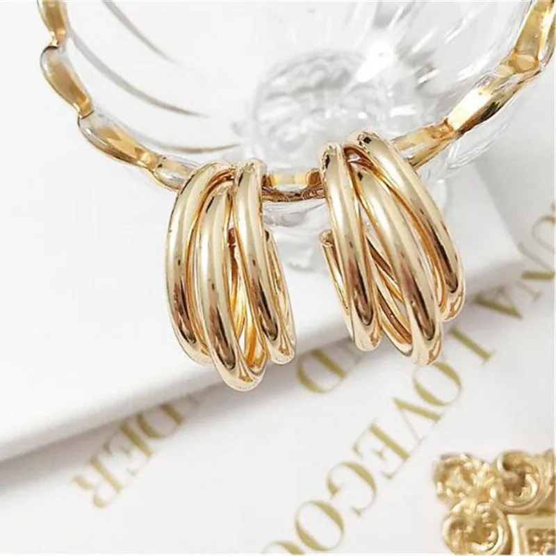 Женские серьги-кольца золотистые серебристые минималистичные с толстой трубкой