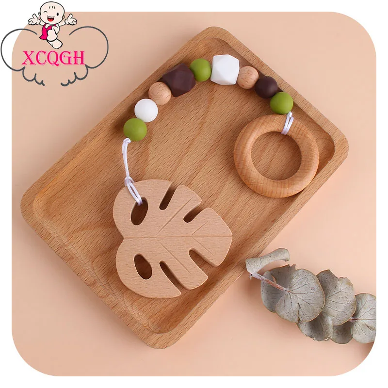 

XCQGH Tropical Banana Leaf Teether Toy Sensory Ring Toy Organic Natural Wood Teething Ring BPA Free Infant Soother Gift