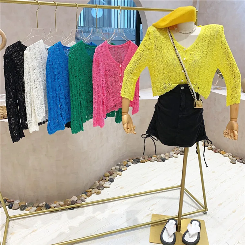 

Niche Design New Women's Clothing Summer 2021 Fashion Versatile Loose Sweet Temperament Hollow Out V-neck Short Knit Shirt Top